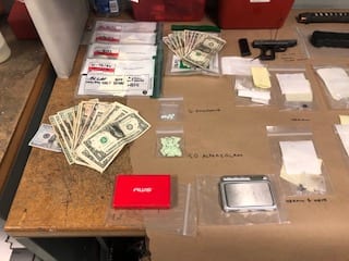 Police Serve Yesler Terrace Warrant, Seize Money, Drugs, Weapons - SPD Blotter