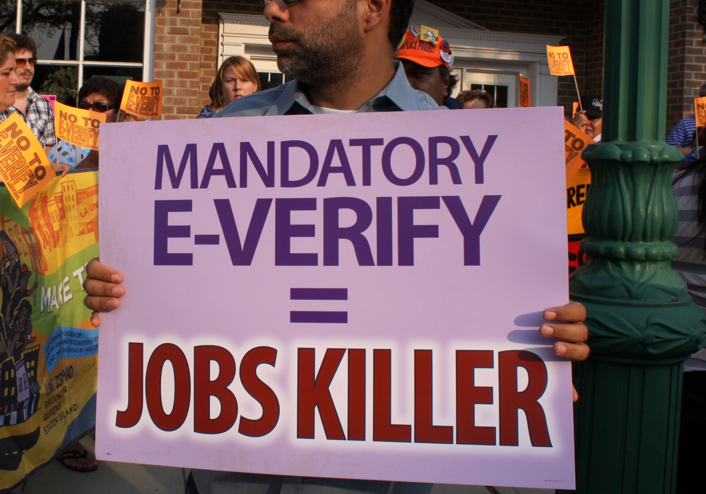 The Economic Costs of E-Verify