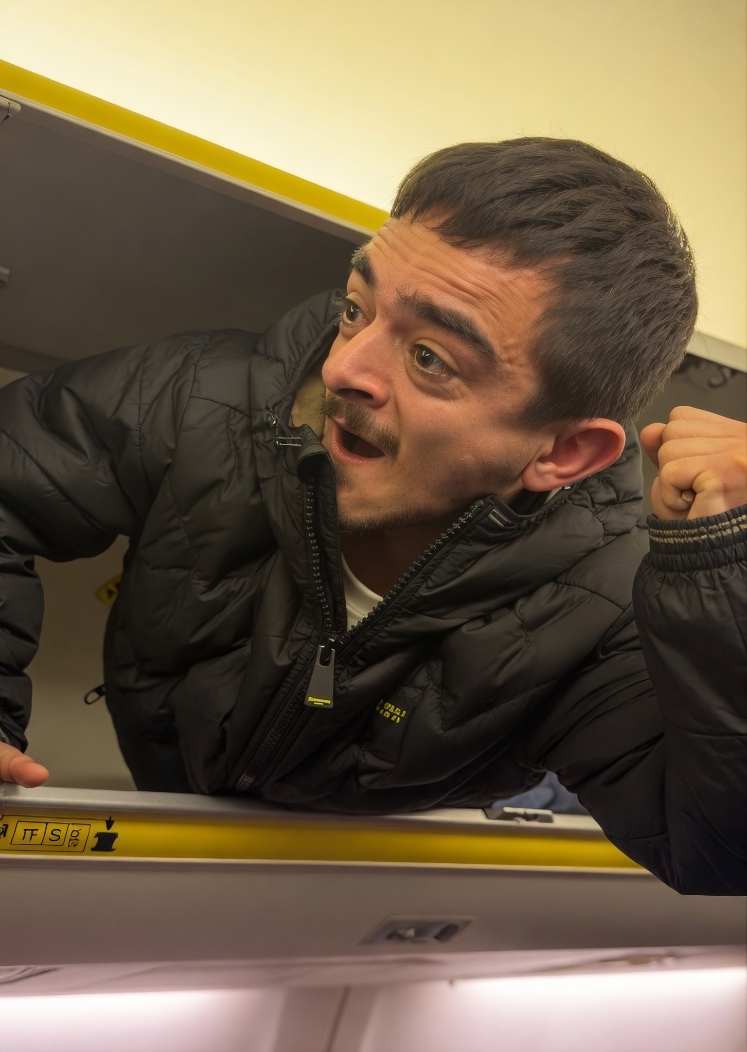 Passenger Crawls Into Overhead Bin On Ryanair Flight To Avoid Paying Fees - View from the Wing