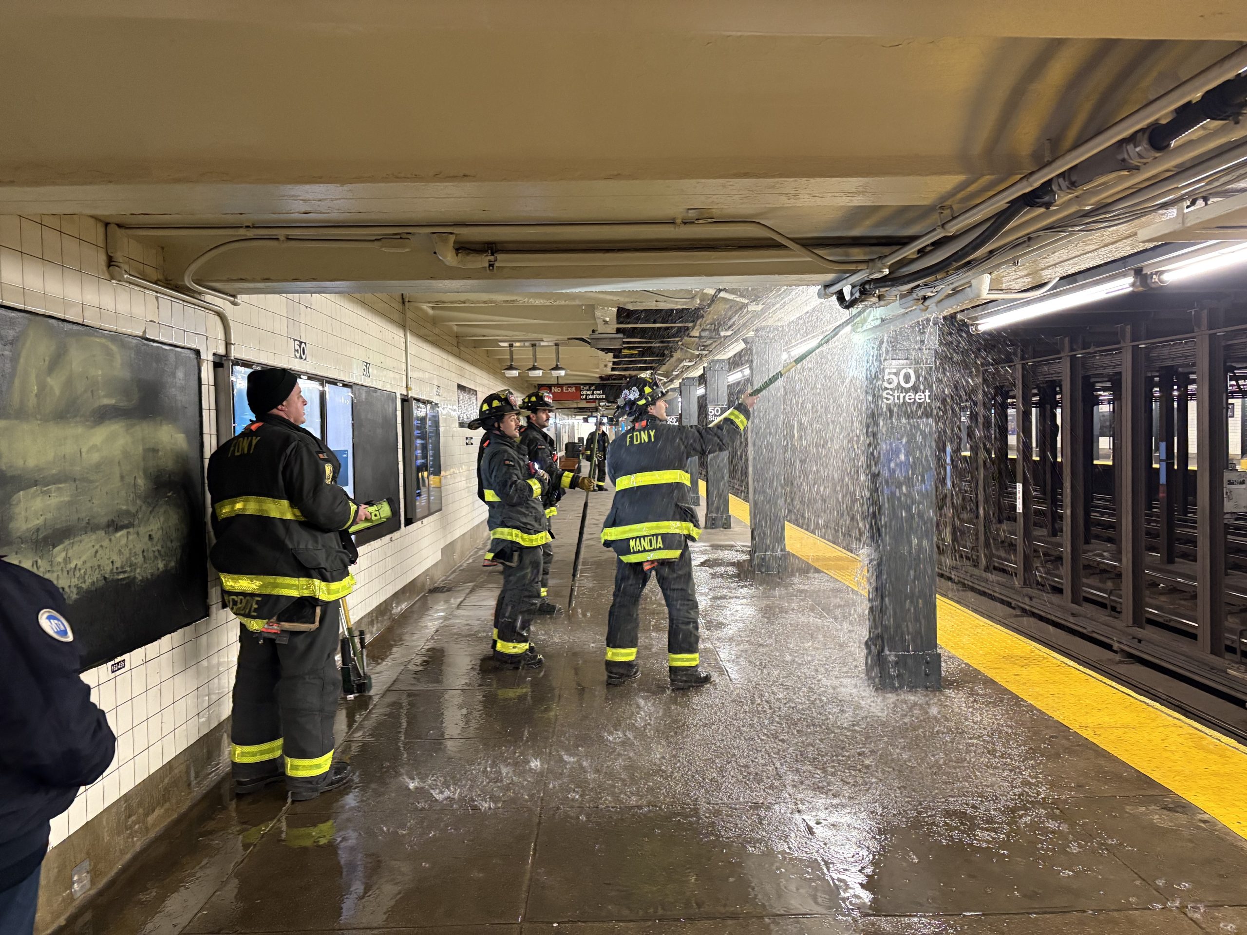 Midday Pipe Burst Floods Downtown C Platform at 50th Street