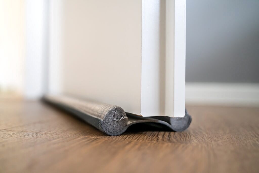 How to Make a DIY Door Draft Stopper | ApartmentGuide