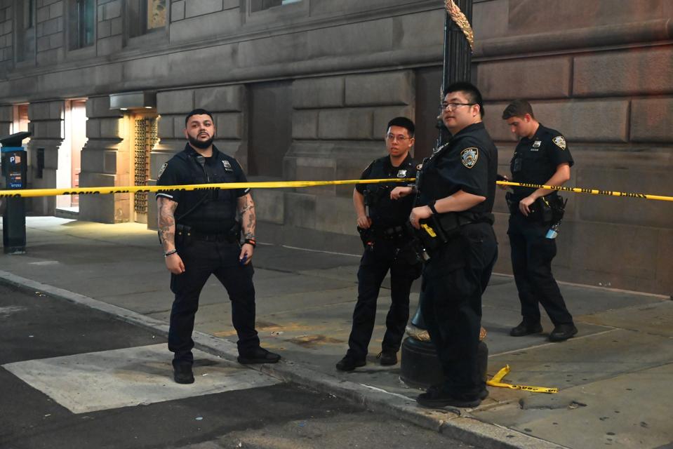 New York City shooting: Gunman kills four, including police officer