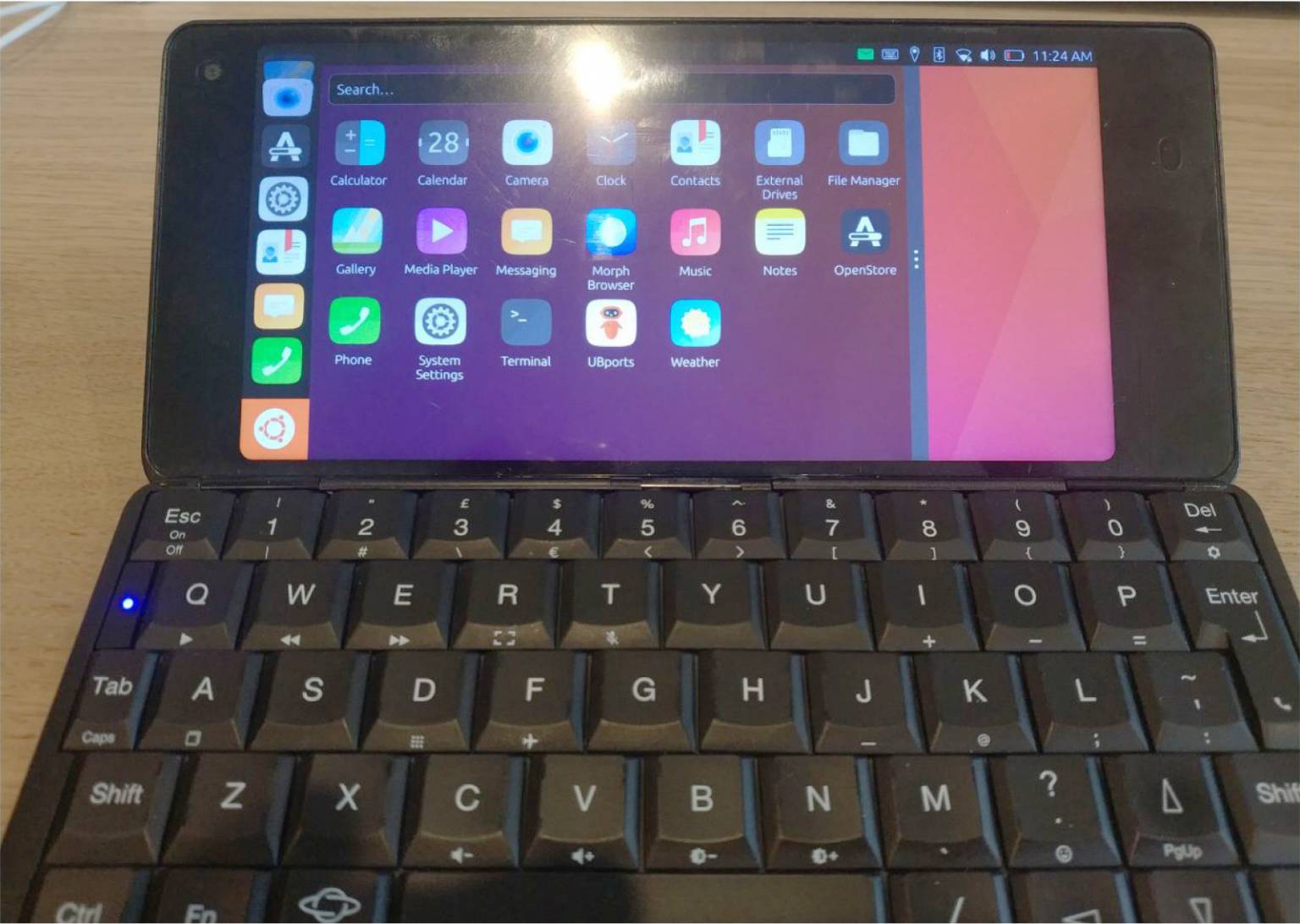 Cosmo Communicator running Ubuntu Touch operating system surface online - Gizmochina