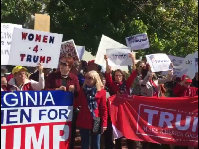 Sign At Pro-Trump Rally At RNC Headquarters: 'Better to Grab a P***y than to Be One'