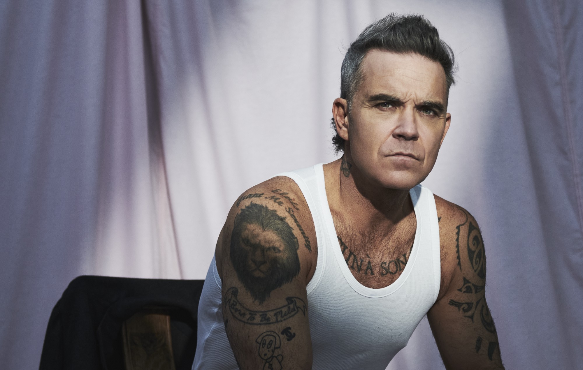 Check out Robbie Williams' exclusive 'British Pop' playlist for NME and new single 'Spies'