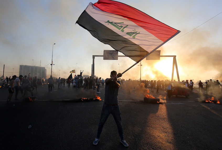 Crises in Iraq and Haiti expose the failure of militarized neoliberalism - Salon.com