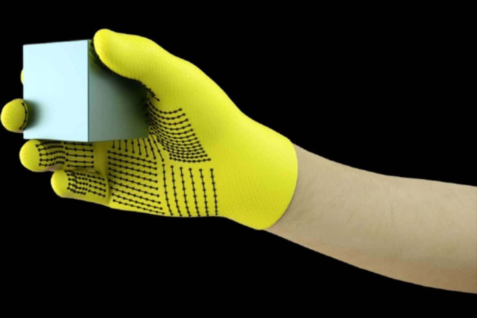 The sensor-packed glove helps neural network identify objects by touch
