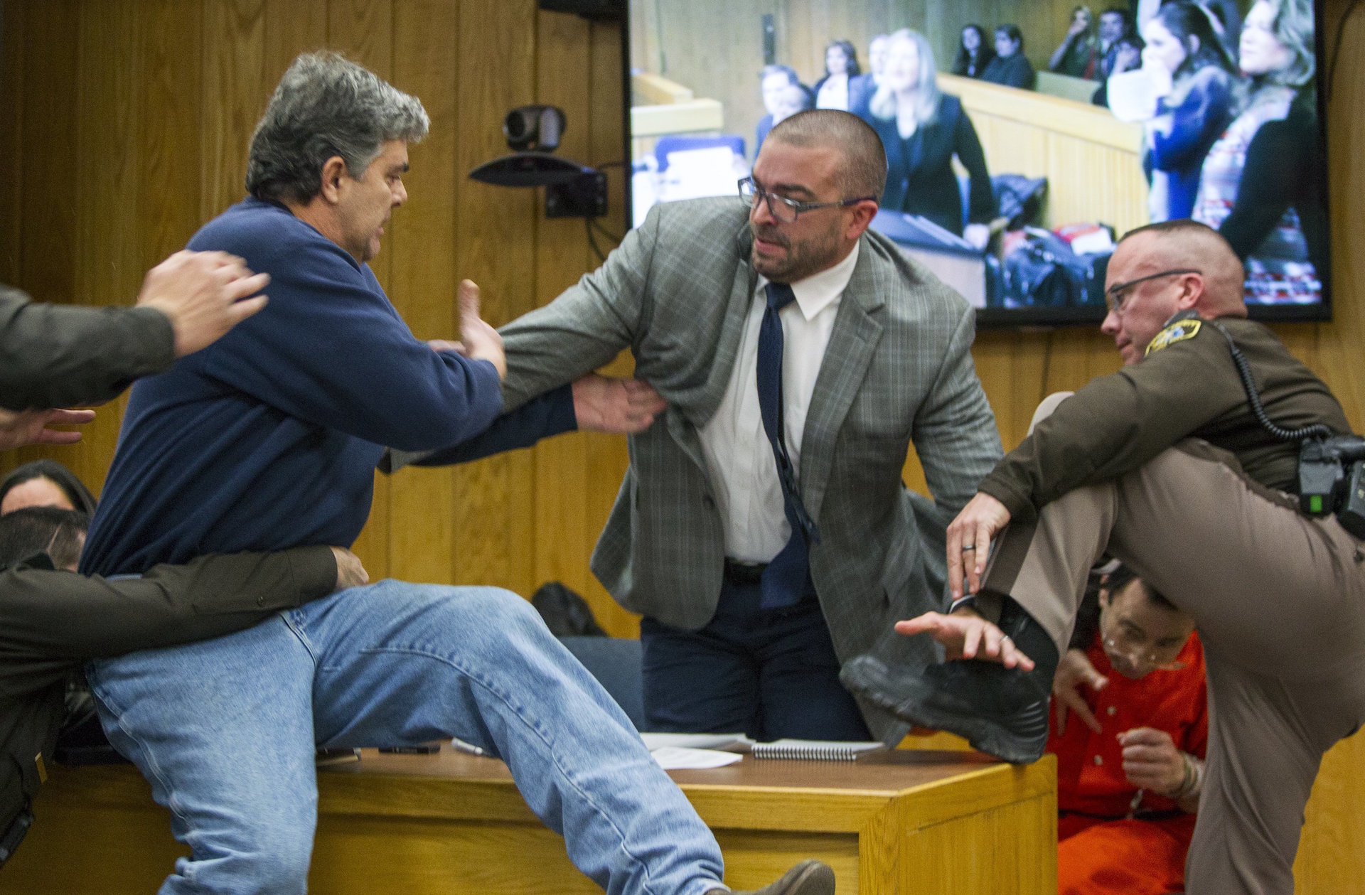 Nassar victims' father tries to attack him in court